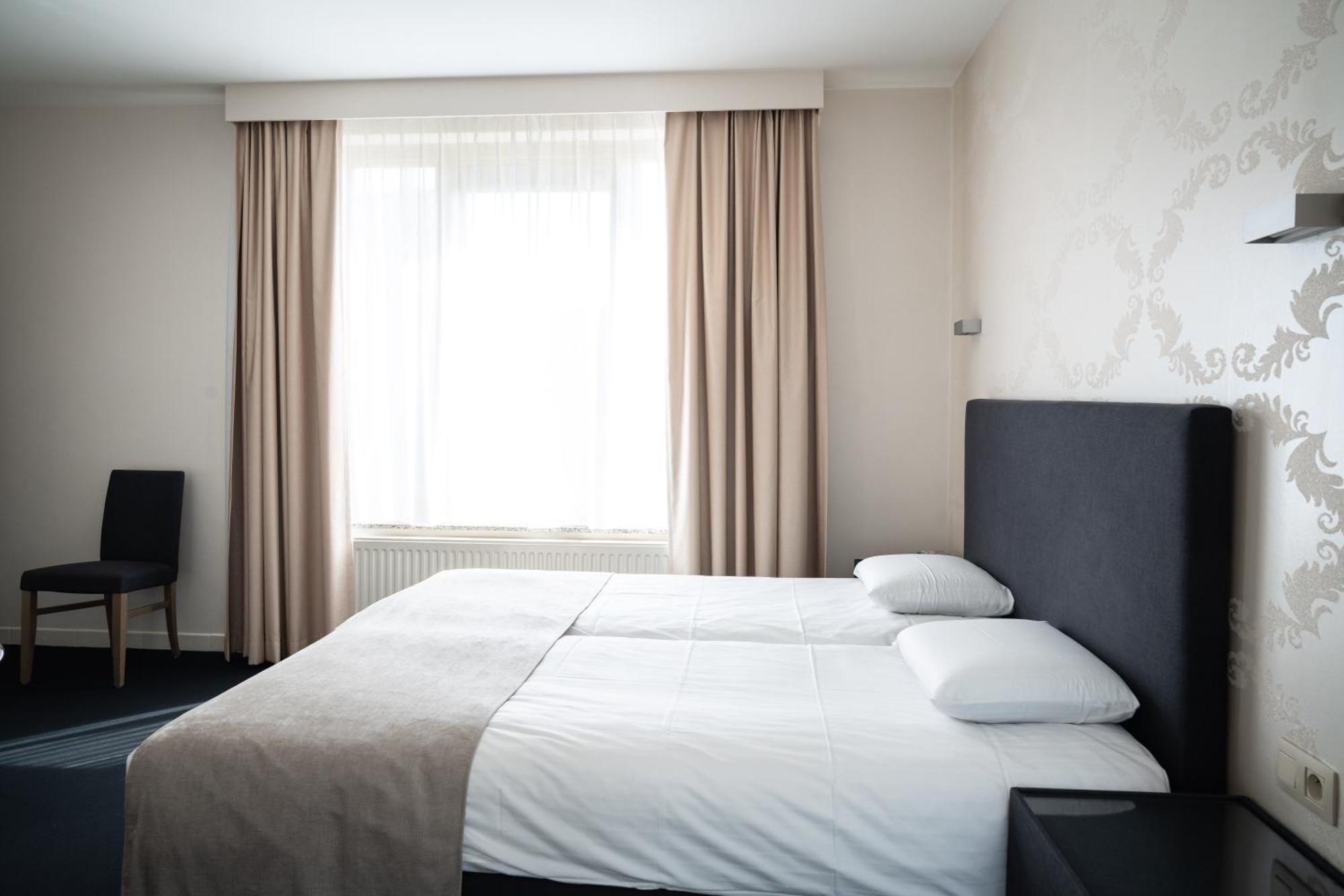 Hotel Essenza Puurs Bagian luar foto