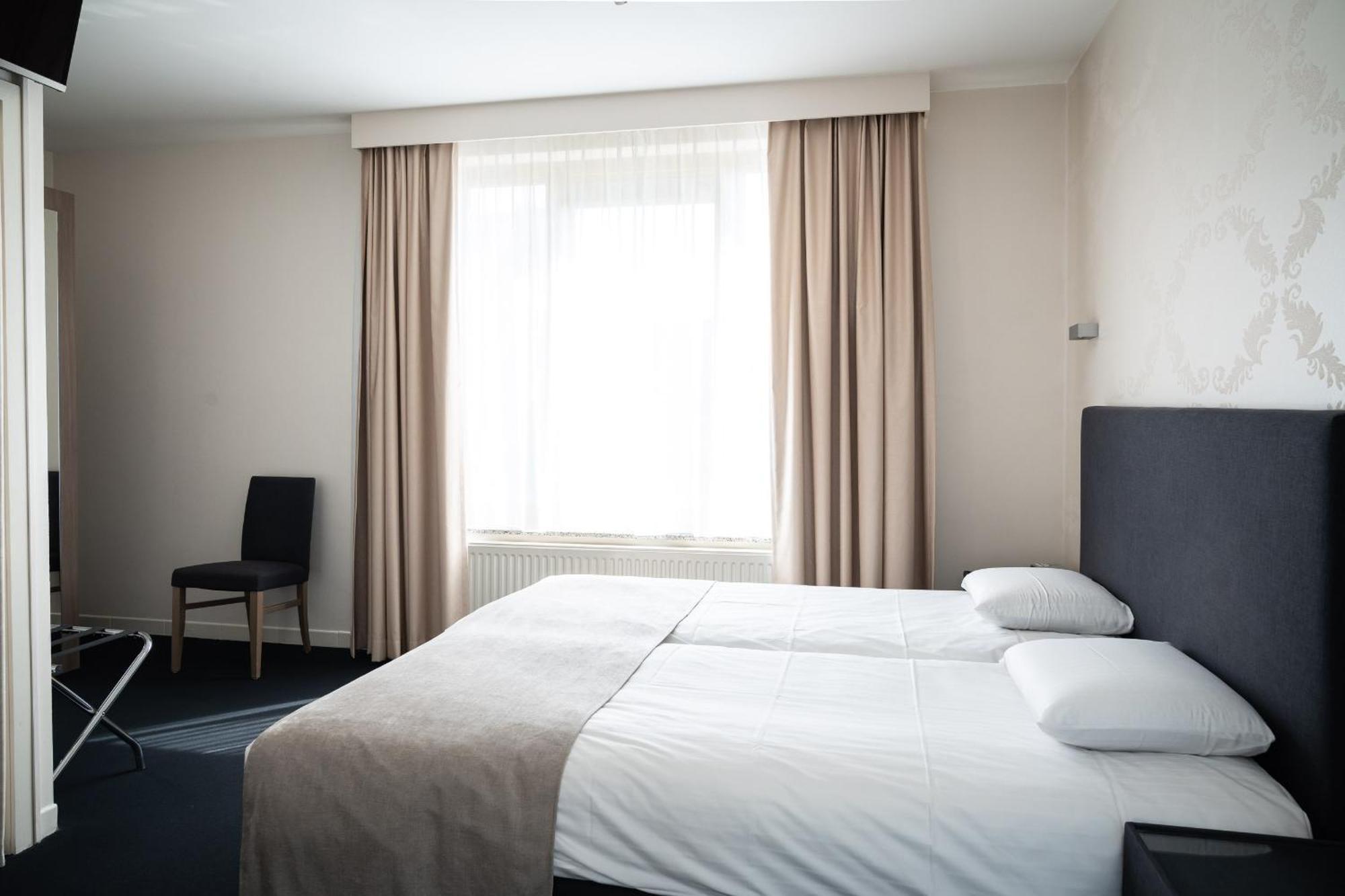 Hotel Essenza Puurs Bagian luar foto